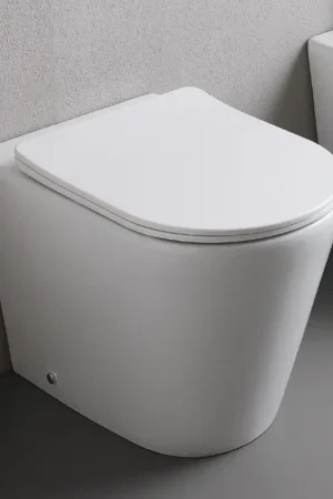 Toilettes sur pied avec abattant fin à fermeture ralentie en céramique blanche - Salice Réduction